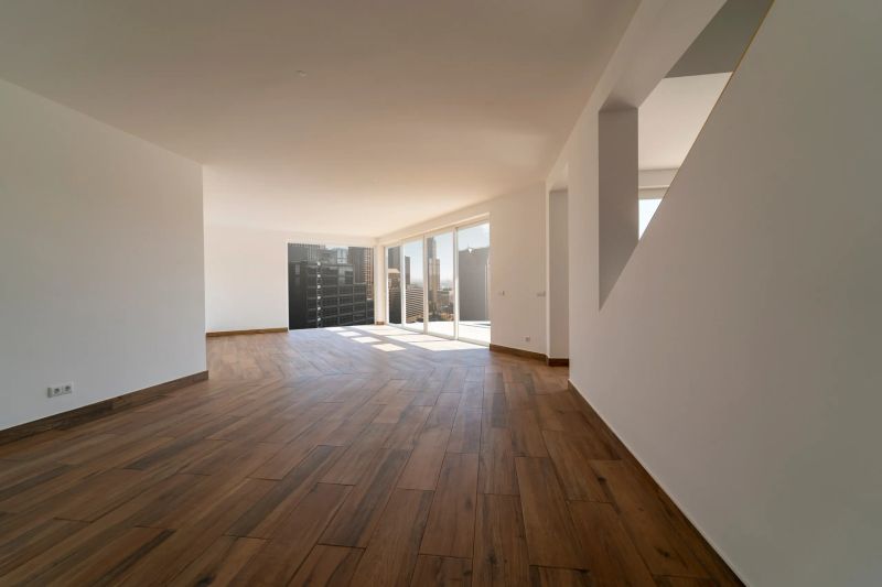 Move-out cleaning — empty kitchen cleaned inside every cabinet