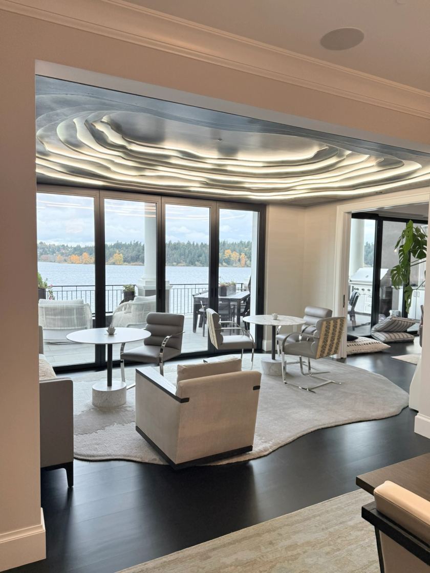Open living room with sculptural ceiling, freshly cleaned